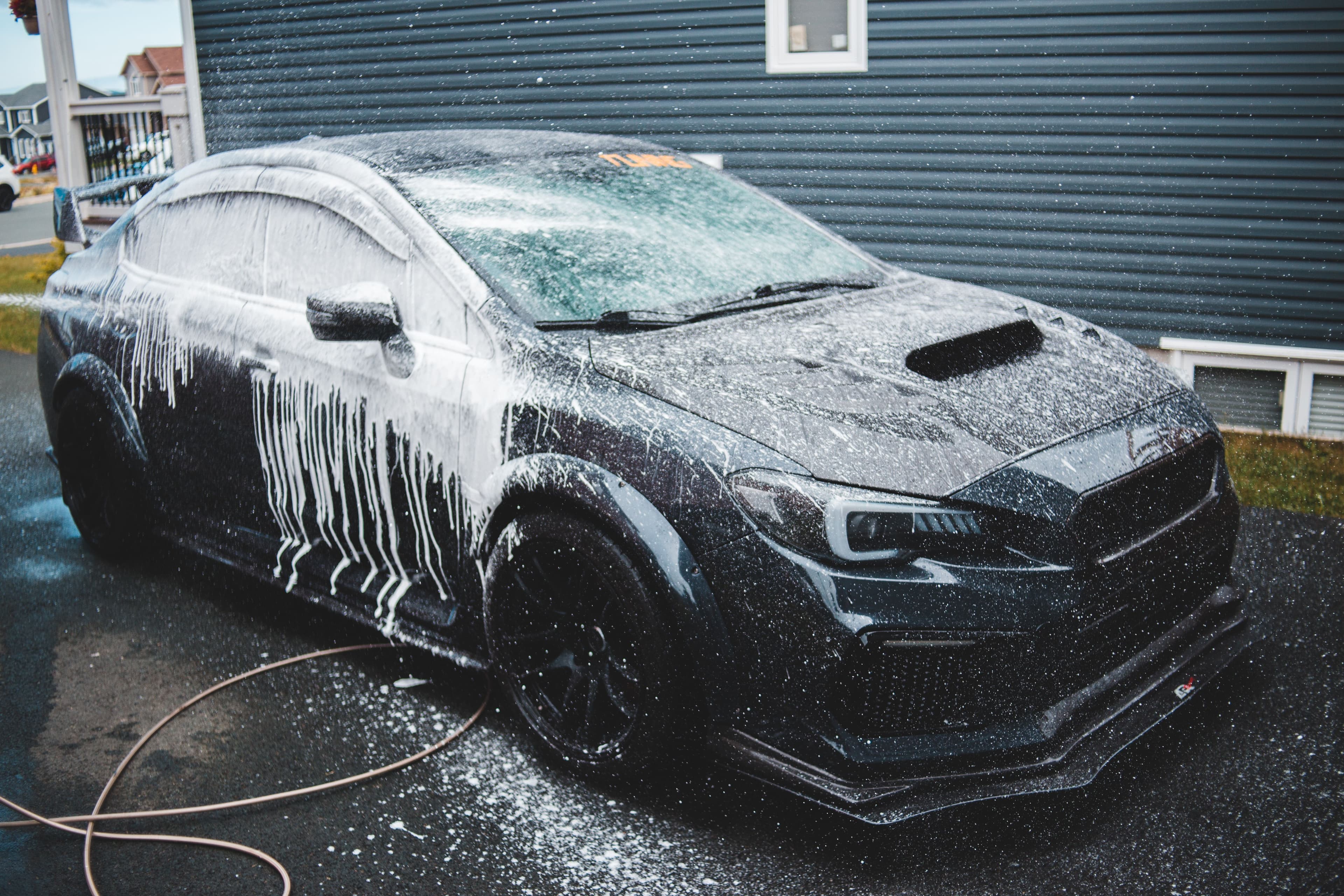 Mobile vehicle cleaning service with snow foam at your location